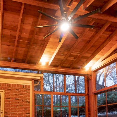 Forever Porch Pavilion (Options: 20' L x 20'-9" W, California Redwood, 2-Post Anchor Kit for High-Wind, No Electrical Wiring Trim, with 2 Fascia Boards for Gutters, 12 ft Posts Height, No Post Decorative Trims, 1 Ceiling Fan Base, No Curtain Rods, with Privacy Panels, Screened Sliding Doors and Fixed Screen Panels, Transparent Premium Sealant). Photo Courtesy of J. Pegg of Cordova, TN.